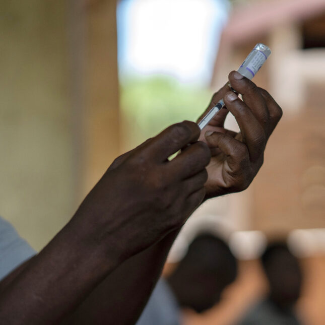 Health officials prepare to administer a vaccine in the Malawi village of Tomali with the world's first vaccine against malaria in a pilot. -- health coverage from STAT