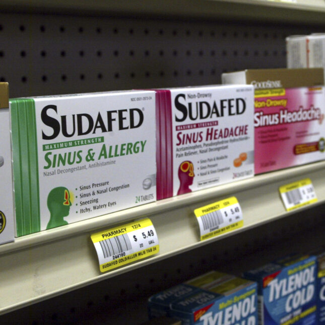 Sudafed and other common nasal decongestants containing pseudoephedrine are on display behind the counter at Hospital Discount Pharmacy in Edmond, Oklahoma.