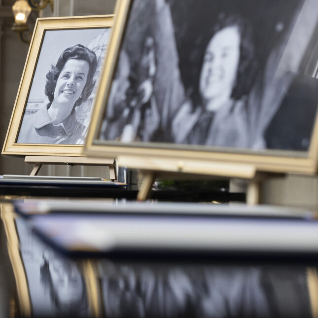 Pictures of U.S. Sen. Dianne Feinstein rest at a condolence book signing for the senator at City Hall in San Francisco. --