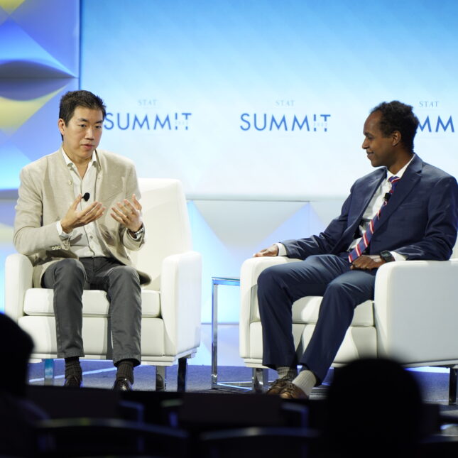David Liu and Jonathan Wosen on the STAT Summit stage.