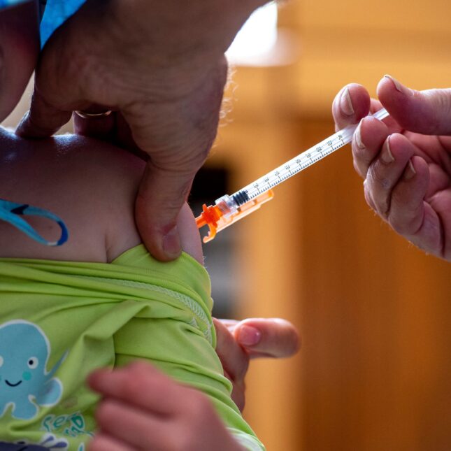 a child receiving vaccine