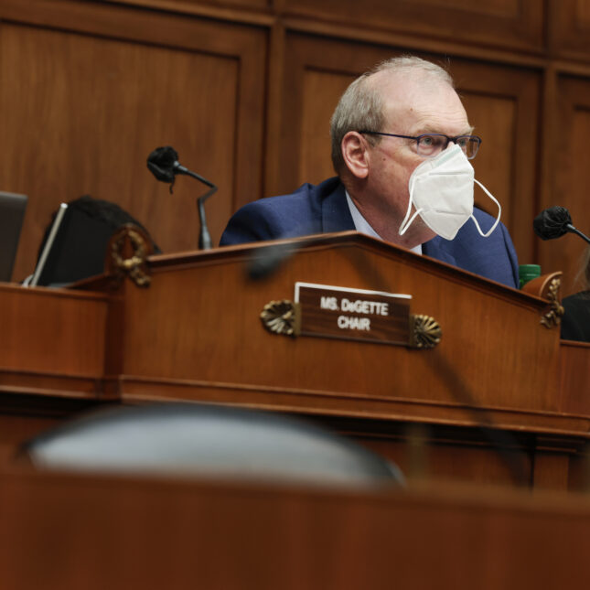 Morgan Griffith sits in a hearing with a mask hanging on his face – politics coverage from STAT