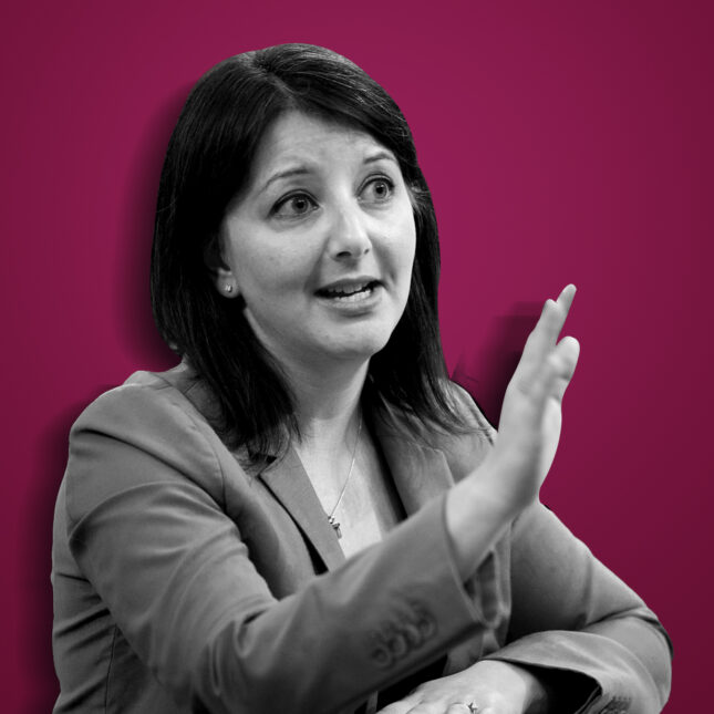 Black and white cutout of Mandy Cohen on reddish purple background – health coverage from STAT